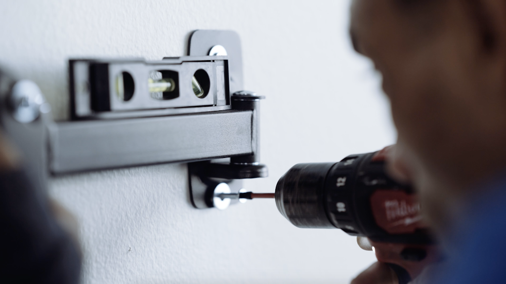 How to Mount a TV - Drill Screws Into the Wall-2