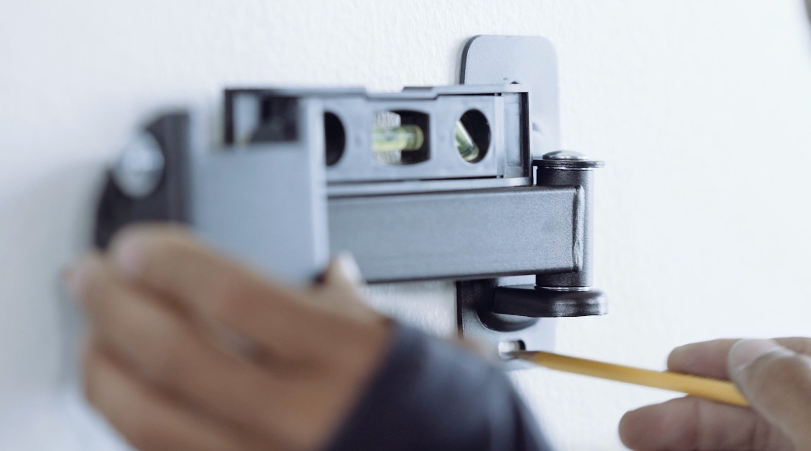 How to Mount a TV - Use Pencil to Mark Holes 