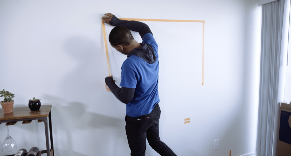 How to Mount a TV - Use Place Tape on the Wall