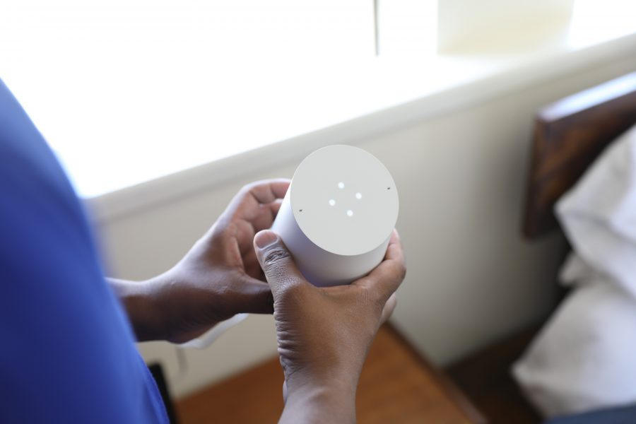 puls technician holding the google home