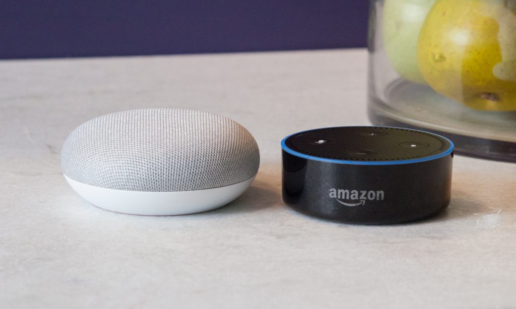 image of Google home mini and amazon echo dot side by side
