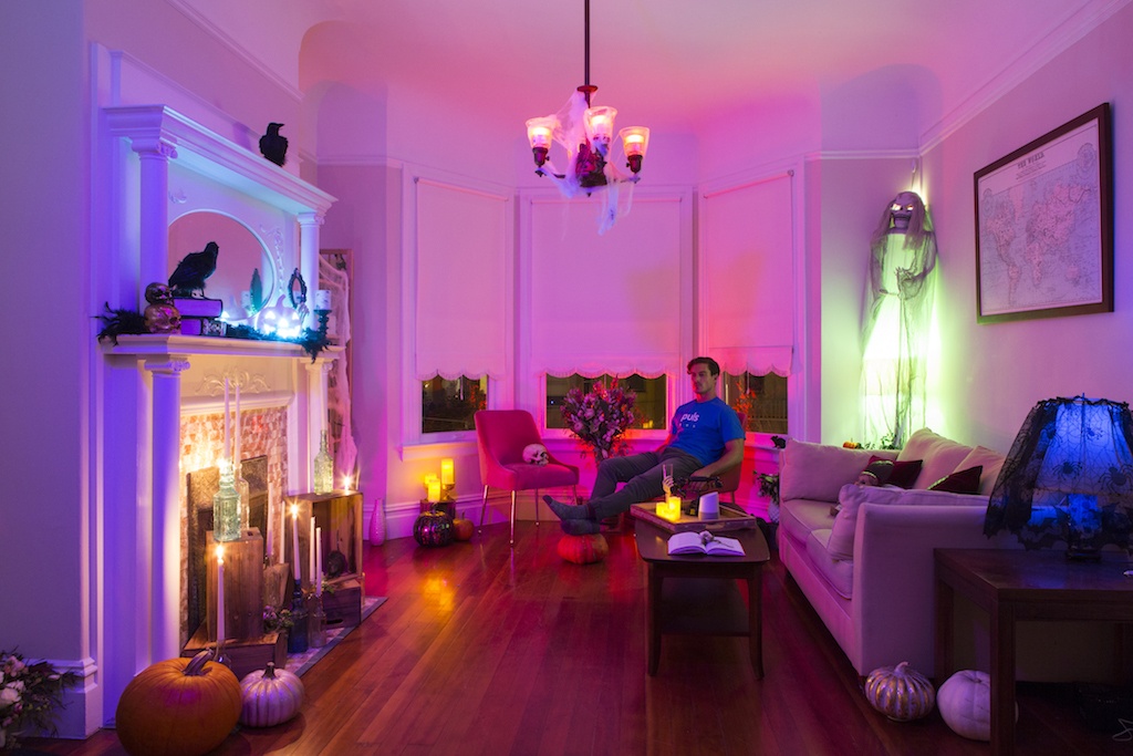 halloween styled living room with smart home lighting