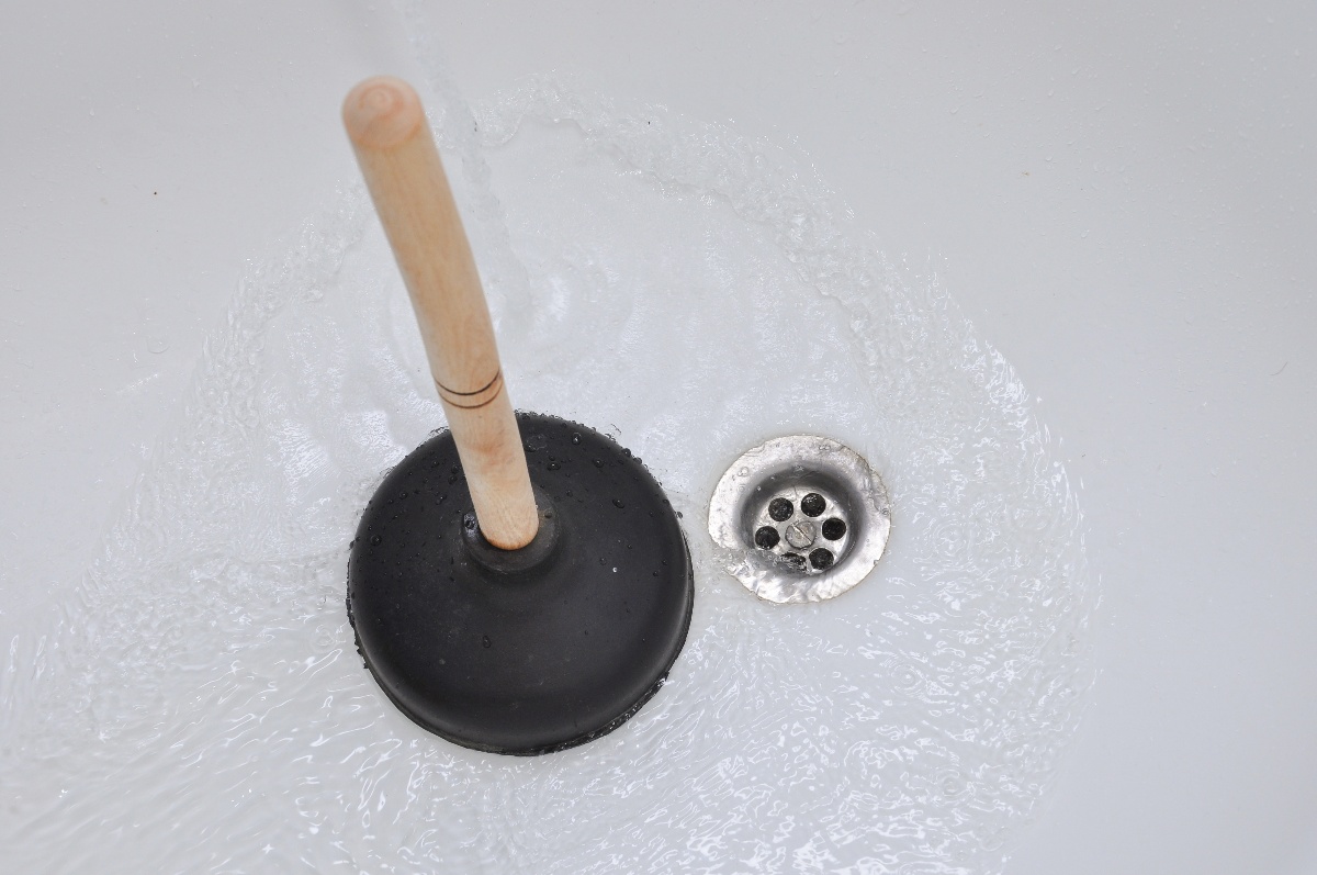 plunging clogged bathtub or shower