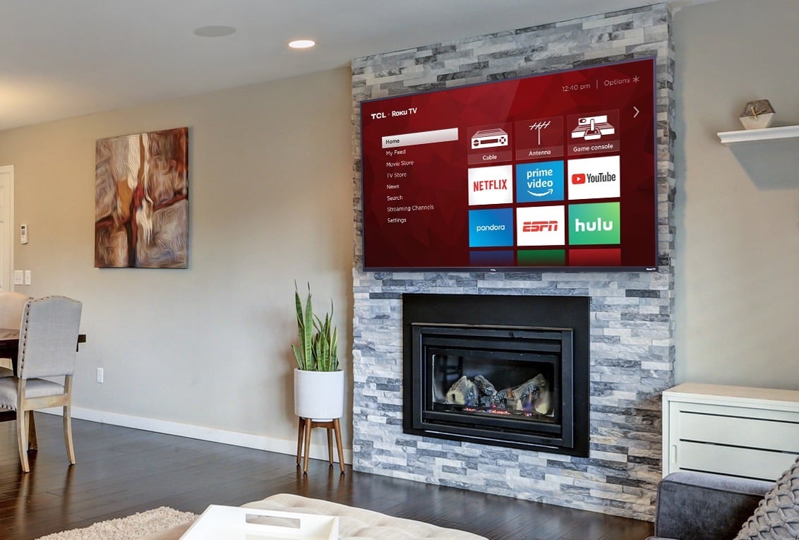 TCL Roku TV above fireplace