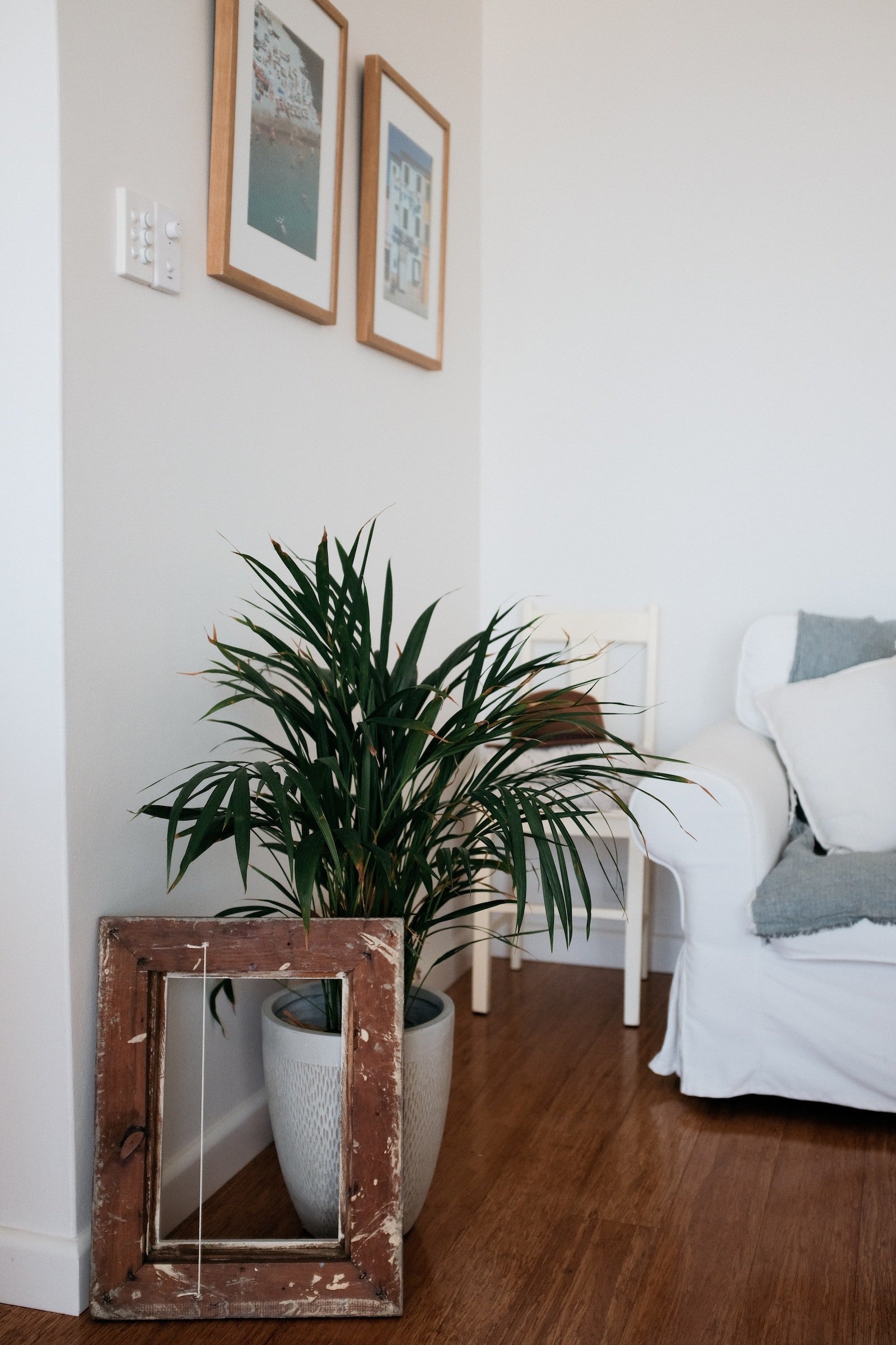 How to Hang Art Without Nails So You Don’t Damage Your Walls