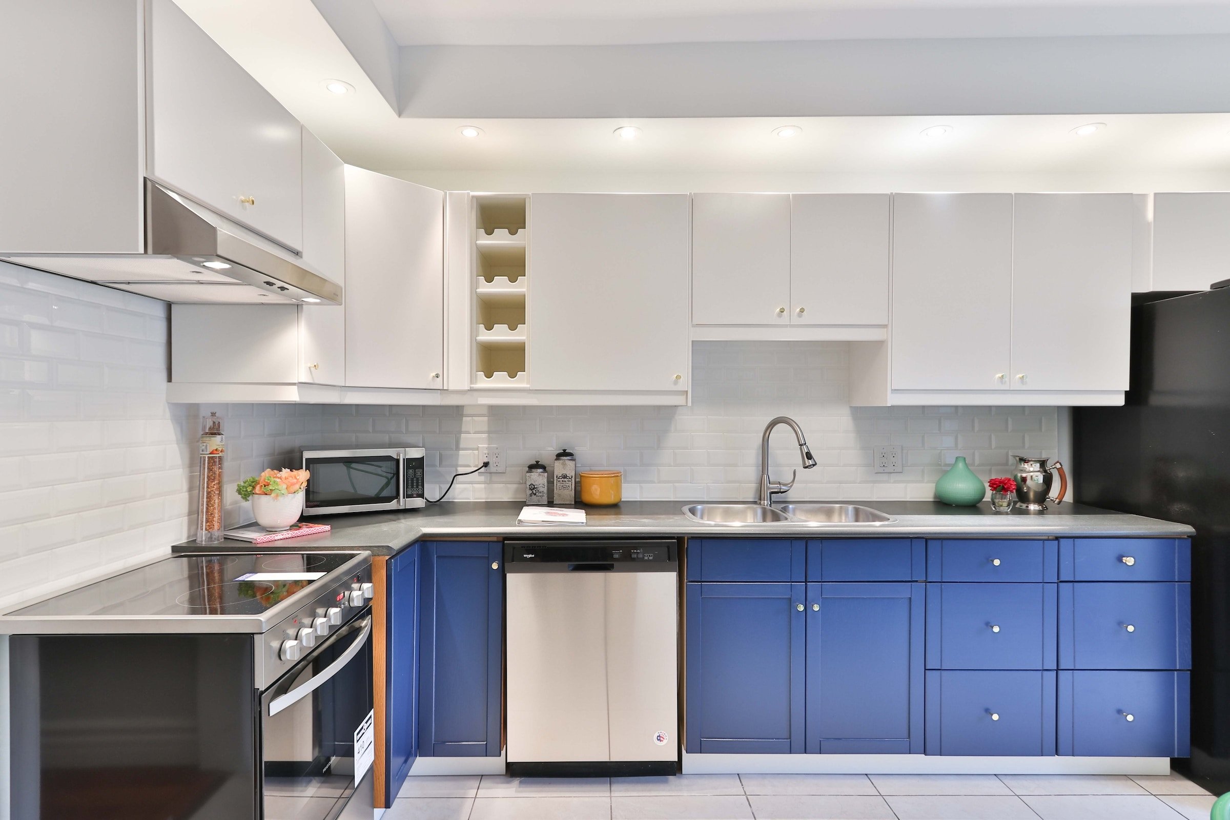 We're loving the two-toned kitchen look that's trending right now!