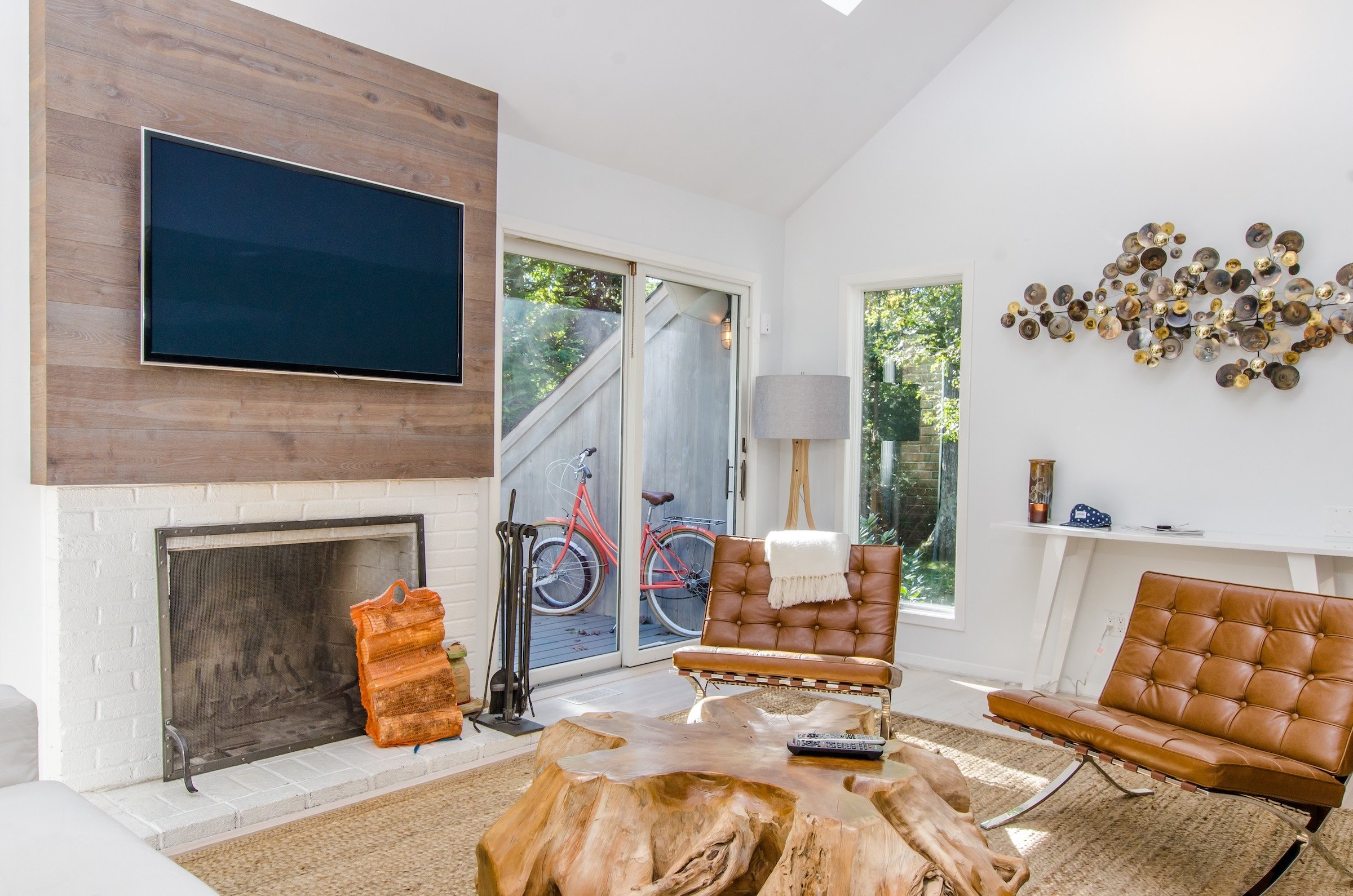 To keep your floor space clear of a TV cabinet, mount the TV on the wall