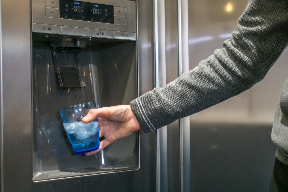 water on fridge door