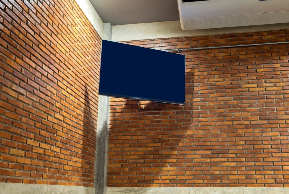 mounted TV in corner wall