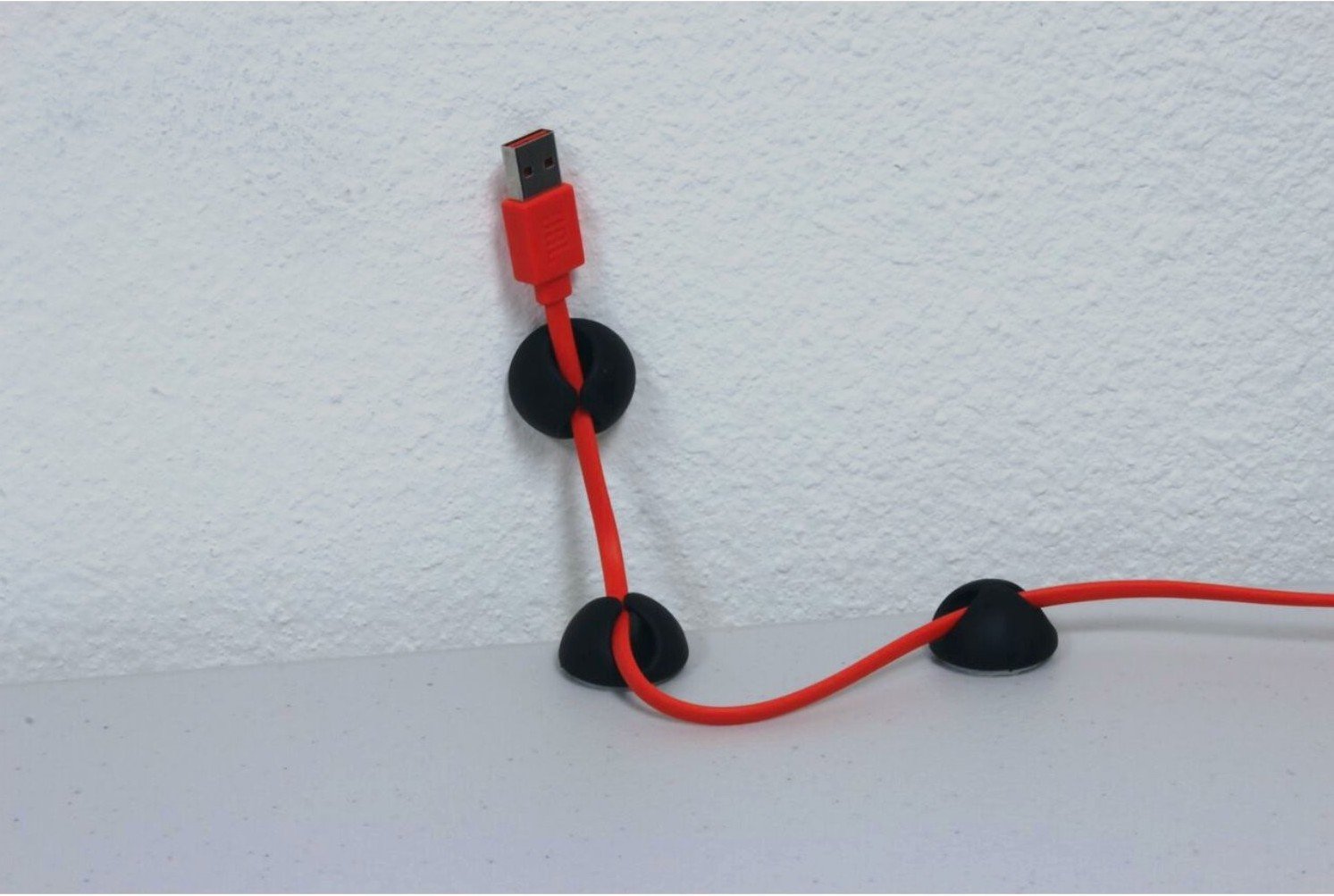 You can also hide tv wires with cable clips. 